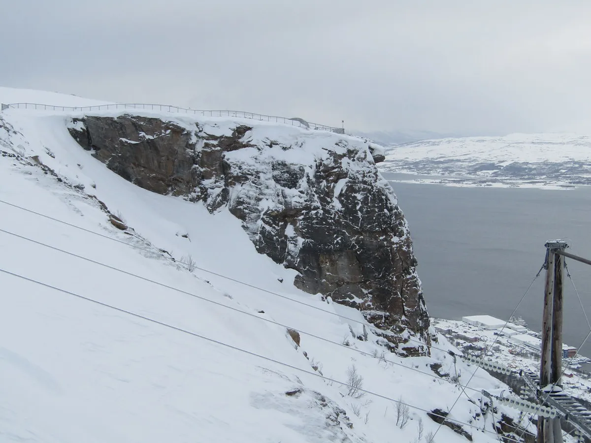 Storsteinen mountain ledge in Tromsø overlooking the Arctic city and surrounding fjords, elevated 421 metres above sea level