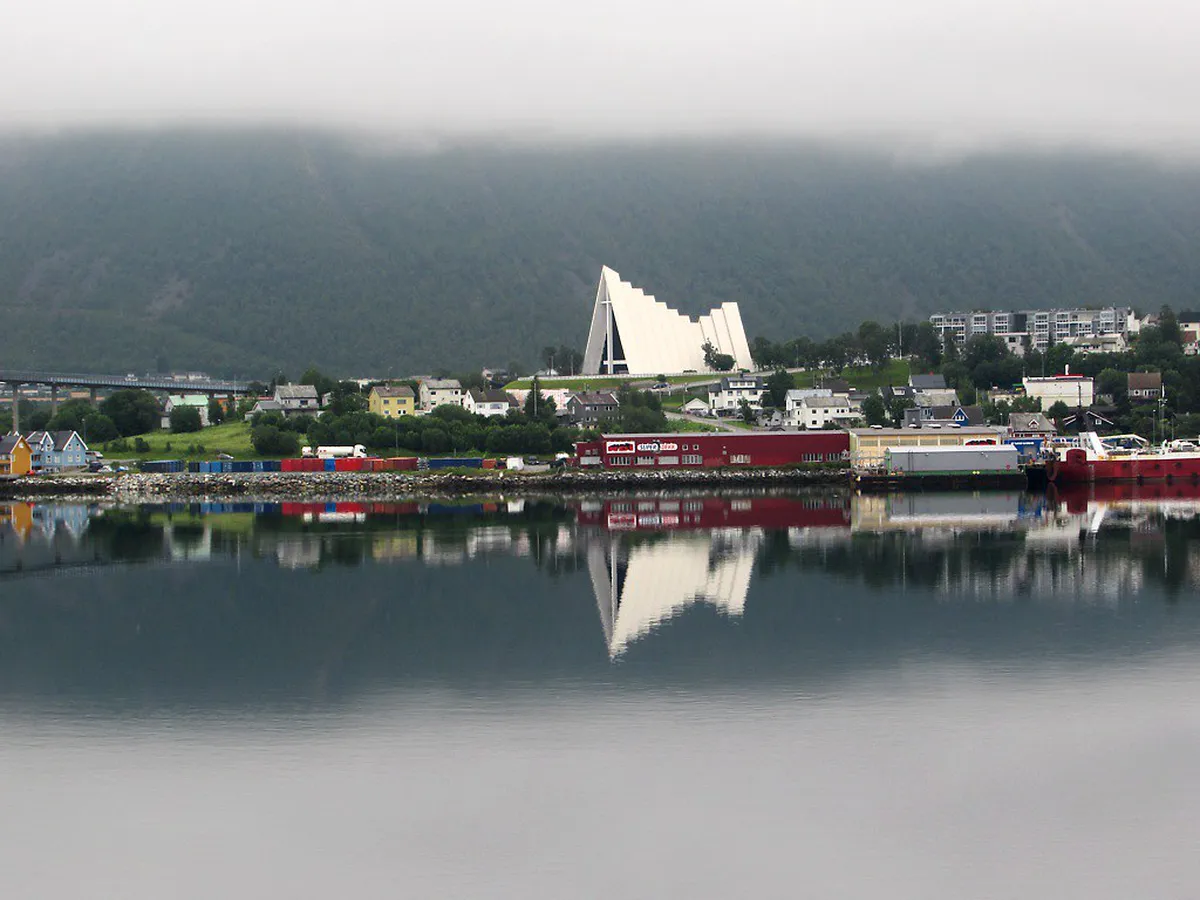 Arctic Cathedral in Tromsø with its striking white triangular architectural form against the Arctic landscape